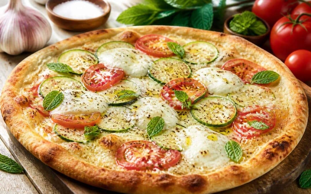 Recette de pizza bianca à la courgette, tomate et menthe